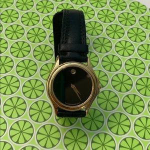 Movado Women’s Black and Gold Museum Watch